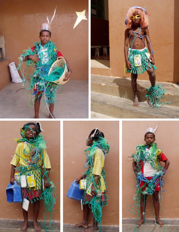 Kids wearing costumes made from garbage