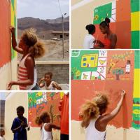 Children painting a mural